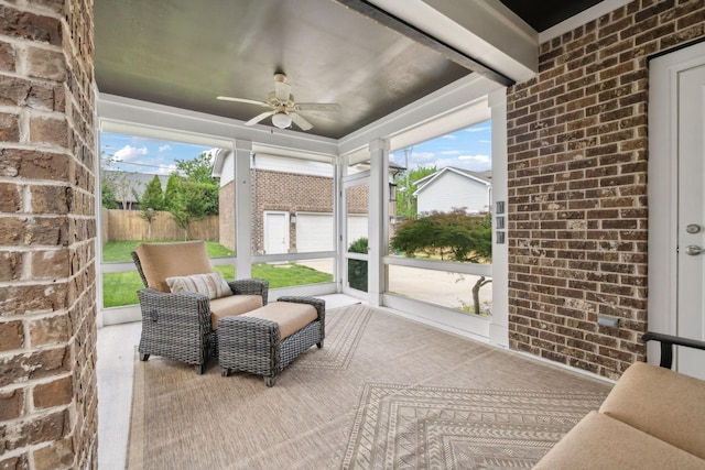 exterior space featuring ceiling fan