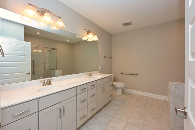 141 Saundersville Rd Unit 1305, Hendersonville, TN 37075 - bathroom with double vanity, visible vents, a stall shower, and a sink