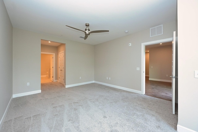 141 Saundersville Rd Unit 1305, Hendersonville, TN 37075 - unfurnished room featuring light colored carpet, visible vents, a ceiling fan, and baseboards