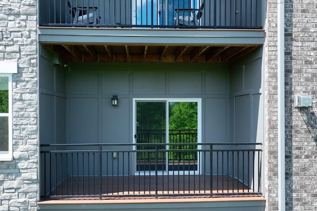 141 Saundersville Rd Unit 1305, Hendersonville, TN 37075 - view of exterior entry with a balcony and stone siding