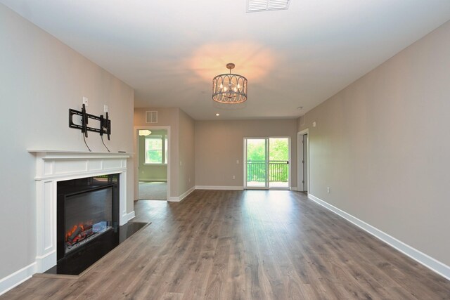 141 Saundersville Rd Unit 1305, Hendersonville, TN 37075 - unfurnished living room featuring an inviting chandelier, visible vents, and plenty of natural light