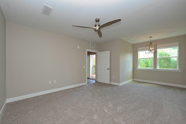 141 Saundersville Rd Unit 1305, Hendersonville, TN 37075 - carpeted spare room featuring visible vents, baseboards, and ceiling fan with notable chandelier