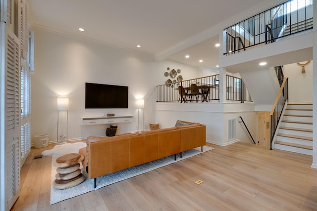 living room with crown molding, stairway, visible vents, recessed lighting, and wood finished floors
