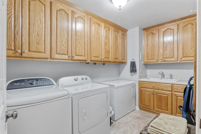 3668 Stonecreek Dr, Spring Hill, TN 37174 - laundry area with a sink, cabinet space, and independent washer and dryer