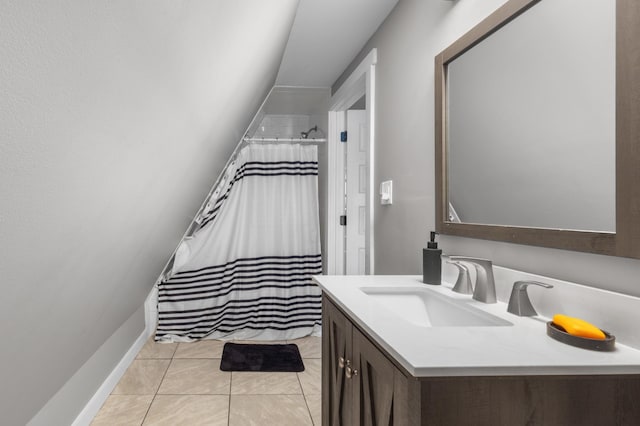 bathroom featuring a shower with shower curtain and vanity