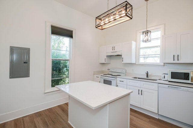 kitchen with a sink, electric panel, dark wood-style floors, under cabinet range hood, and white appliances