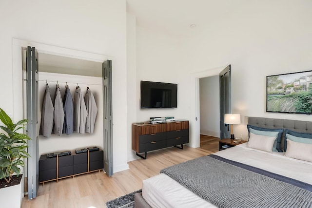 bedroom featuring light wood-type flooring
