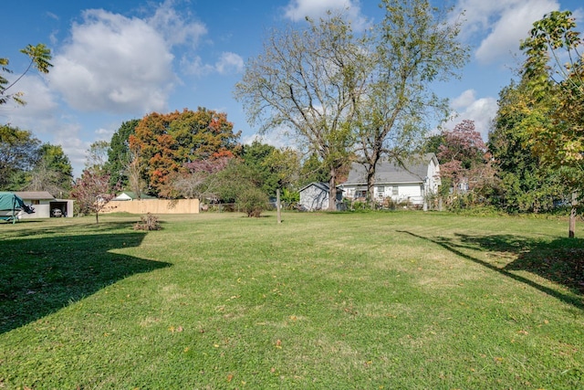 view of yard with fence