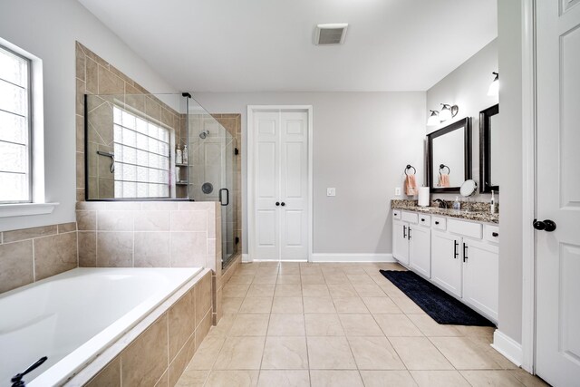 230 Fowler Cir, Franklin, TN 37064 - bathroom with visible vents, a shower stall, tile patterned floors, a garden tub, and vanity