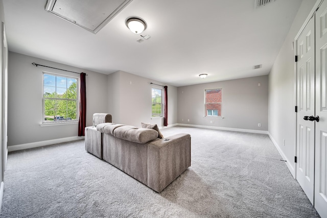 230 Fowler Cir, Franklin, TN 37064 - carpeted living room featuring attic access, baseboards, and visible vents