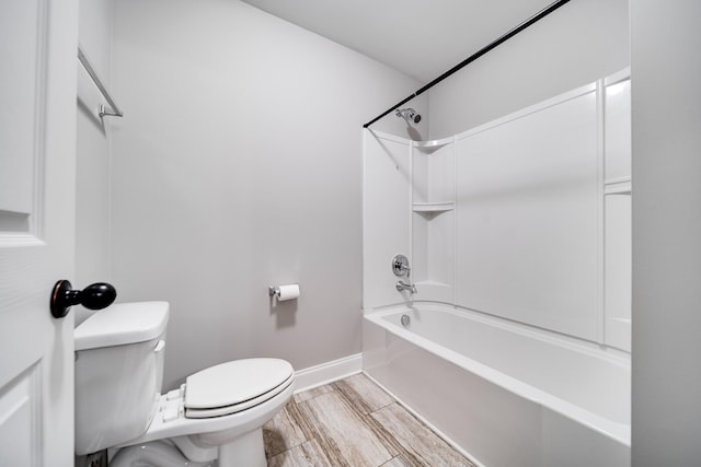 230 Fowler Cir, Franklin, TN 37064 - bathroom featuring toilet, baseboards, and bathtub / shower combination