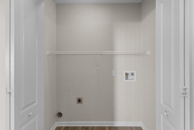 184 Whitman Aly, Clarksville, TN 37043 - laundry room featuring wood finished floors, laundry area, electric dryer hookup, washer hookup, and baseboards