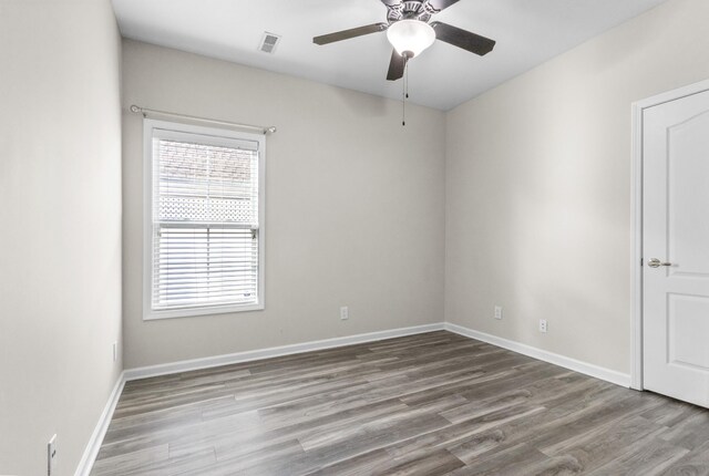 184 Whitman Aly, Clarksville, TN 37043 - empty room with baseboards, visible vents, wood finished floors, and ceiling fan