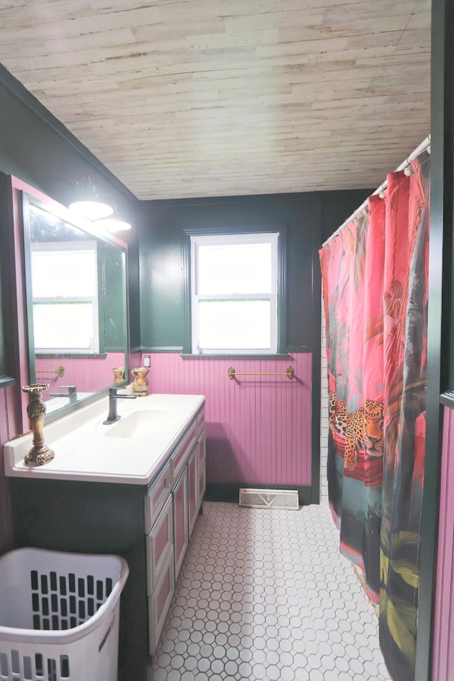 bathroom featuring wood ceiling, vanity, a wainscoted wall, and a shower with shower curtain
