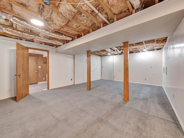 finished basement with carpet flooring