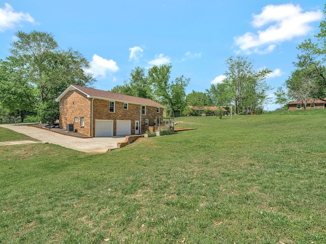 exterior space with a garage and driveway