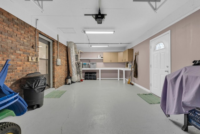 74 Farmer Rd, Crossville, TN 38571 - garage featuring baseboards