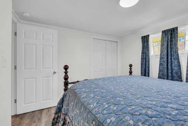 74 Farmer Rd, Crossville, TN 38571 - bedroom featuring wood finished floors, crown molding, and a closet