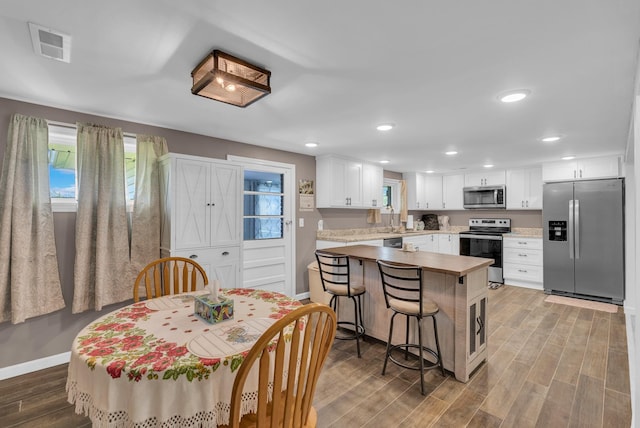 74 Farmer Rd, Crossville, TN 38571 - kitchen featuring baseboards, light countertops, appliances with stainless steel finishes, and light wood finished floors