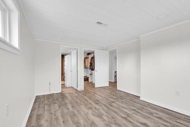 74 Farmer Rd, Crossville, TN 38571 - interior space with ornamental molding, visible vents, wood finished floors, and baseboards