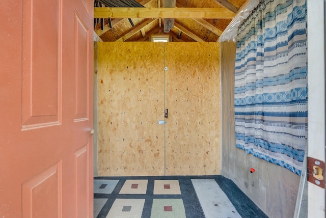 74 Farmer Rd, Crossville, TN 38571 - empty room with tile patterned floors and lofted ceiling