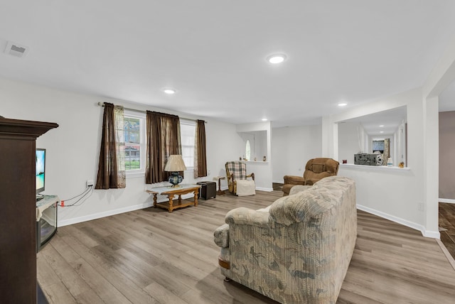 74 Farmer Rd, Crossville, TN 38571 - living room featuring baseboards, visible vents, wood finished floors, and recessed lighting