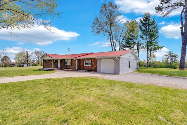 74 Farmer Rd, Crossville, TN 38571 - ranch-style house featuring a garage, driveway, metal roof, and a front yard