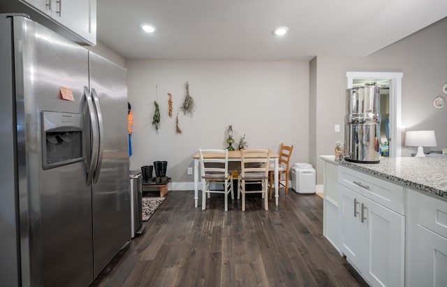 675 Hog Back Ridge Rd, Bethpage, TN 37022 - kitchen with stainless steel refrigerator with ice dispenser, dark wood-style flooring, white cabinets, light stone counters, and recessed lighting