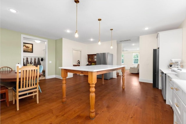 153 Lewis Rd, Morrison, TN 37357 - kitchen featuring appliances with stainless steel finishes, visible vents, light countertops, and white cabinets