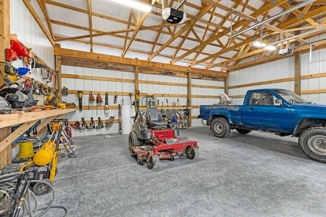153 Lewis Rd, Morrison, TN 37357 - garage featuring a garage door opener and metal wall