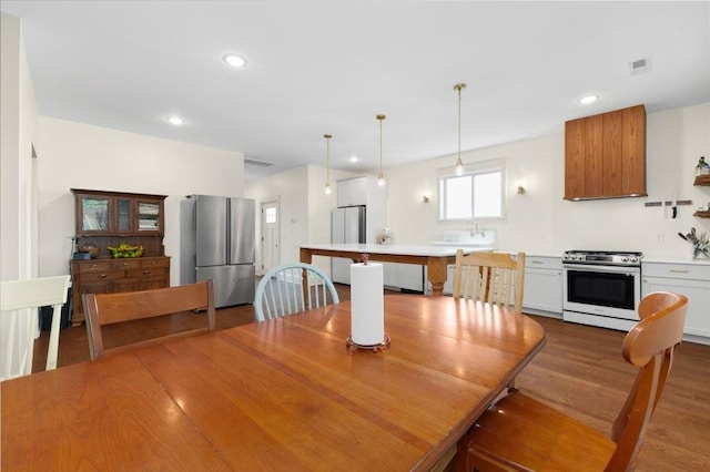 153 Lewis Rd, Morrison, TN 37357 - dining room featuring wood finished floors, recessed lighting, and visible vents