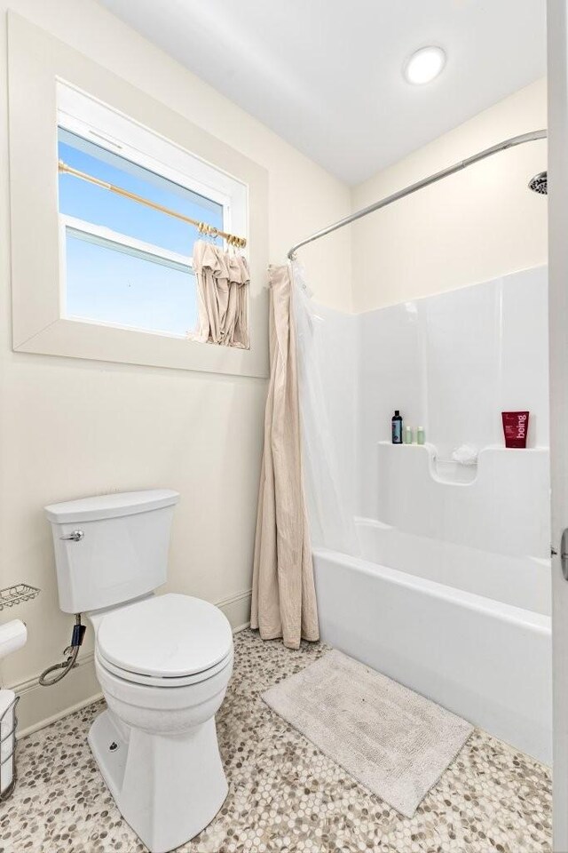 153 Lewis Rd, Morrison, TN 37357 - full bathroom with shower / bathtub combination with curtain, toilet, and baseboards