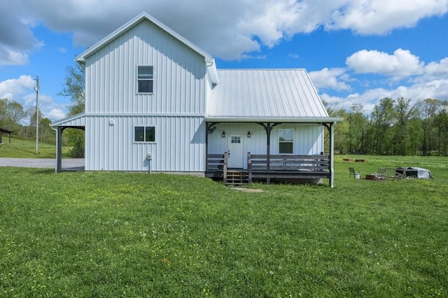 153 Lewis Rd, Morrison, TN 37357 - rear view of property featuring a porch, a lawn, and metal roof