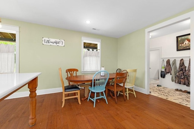 153 Lewis Rd, Morrison, TN 37357 - dining space with visible vents, baseboards, wood finished floors, and a healthy amount of sunlight