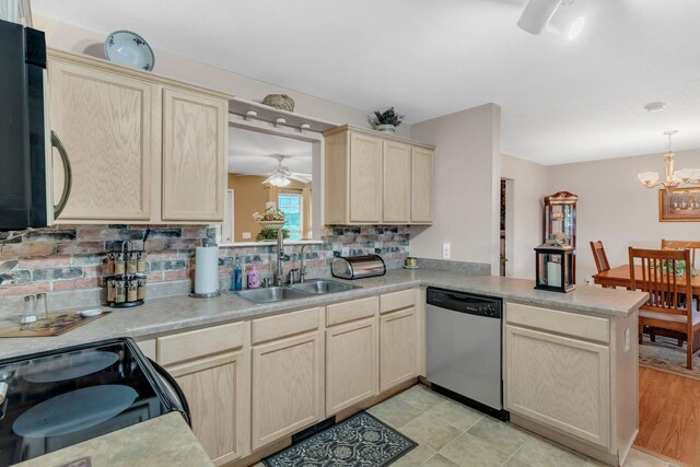 1368 Jason Cir, Ashland City, TN 37015 - kitchen featuring a sink, a peninsula, light countertops, black electric range, and dishwasher
