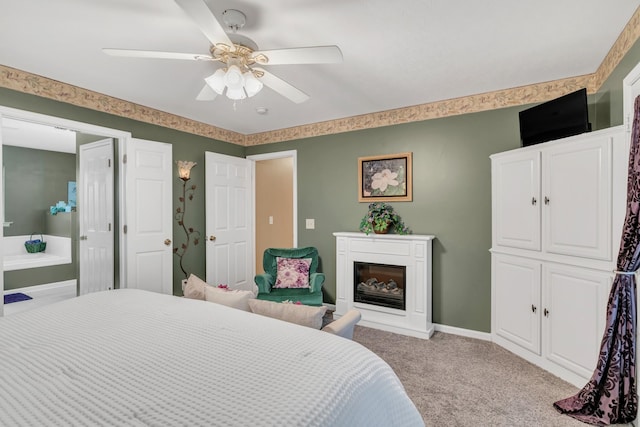 1368 Jason Cir, Ashland City, TN 37015 - bedroom with a ceiling fan, carpet flooring, baseboards, and a glass covered fireplace