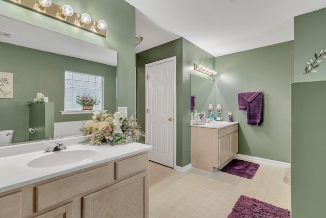 1368 Jason Cir, Ashland City, TN 37015 - bathroom featuring two vanities, a sink, tile patterned floors, and visible vents