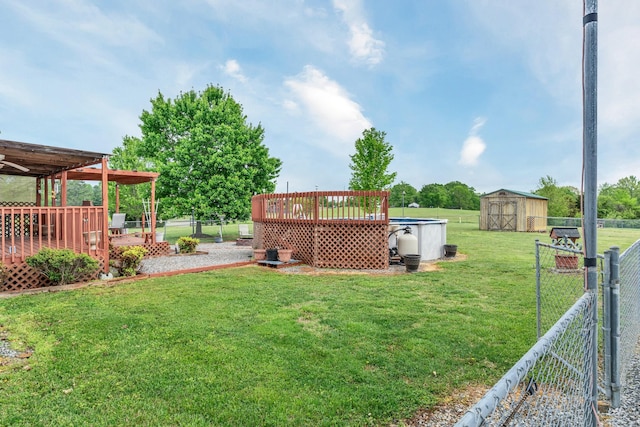 1368 Jason Cir, Ashland City, TN 37015 - view of yard with a deck, a fenced backyard, a shed, and an outdoor structure