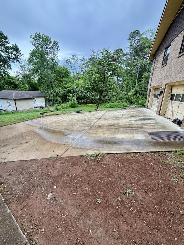 view of yard with an attached garage
