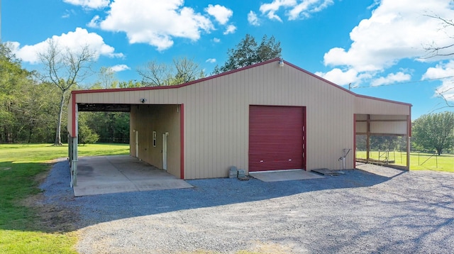 garage featuring driveway and a garage
