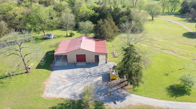 birds eye view of property featuring a rural view