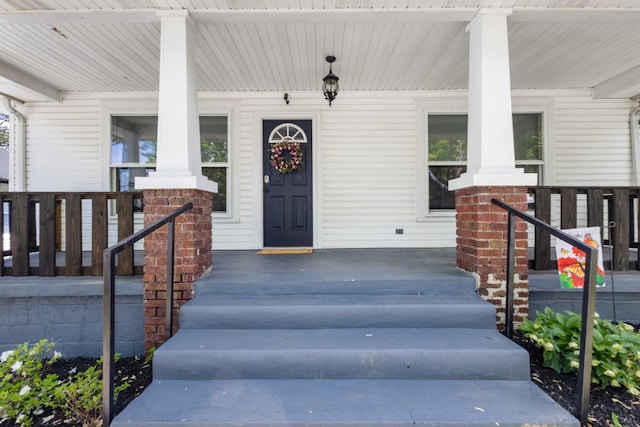 property entrance with a porch