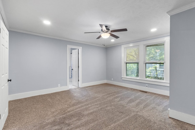 carpeted empty room with ceiling fan, recessed lighting, ornamental molding, and baseboards