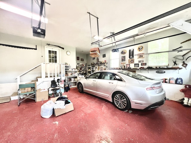 garage featuring a garage door opener