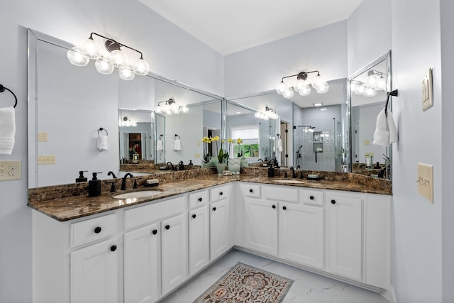 1004 Sattui Ct, Franklin, TN 37064 - bathroom with marble look tile flooring, a stall shower, and double vanity