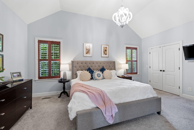 1004 Sattui Ct, Franklin, TN 37064 - bedroom featuring vaulted ceiling, multiple windows, light colored carpet, and a chandelier