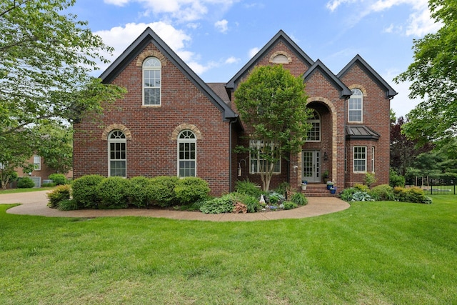1004 Sattui Ct, Franklin, TN 37064 - view of front of house with brick siding and a front lawn