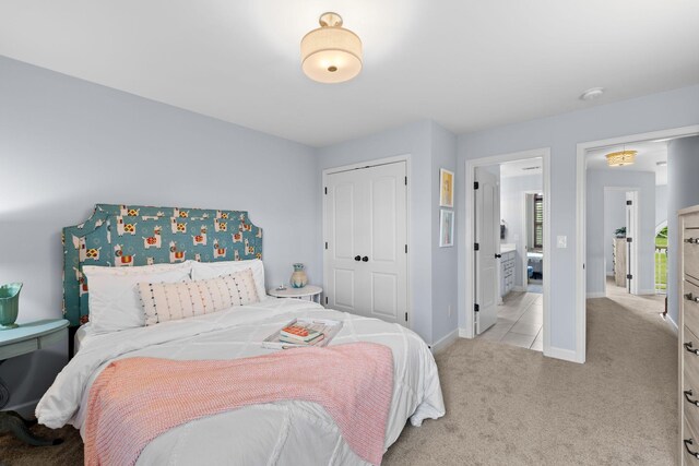 1004 Sattui Ct, Franklin, TN 37064 - bedroom featuring light colored carpet, baseboards, and a closet