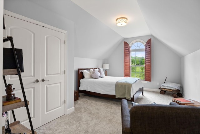 1004 Sattui Ct, Franklin, TN 37064 - bedroom featuring light carpet, lofted ceiling, and baseboards