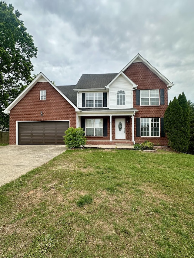 view of front facade featuring a front yard, a garage, covered porch, brick siding, and concrete driveway